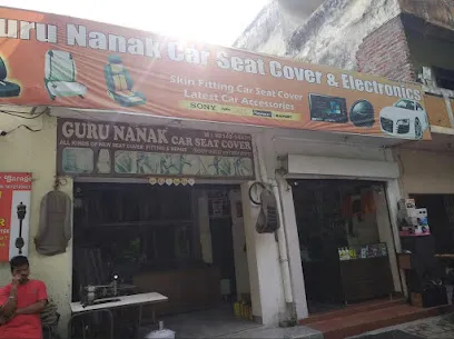 Guru Nanak car seat cover and electronics