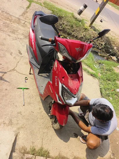 Radhe enterprises EV scooty service centre