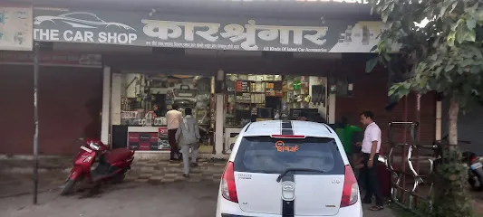 THE CAR SHOP,KOTMA{deals in four wheeeler cars motor and body parts