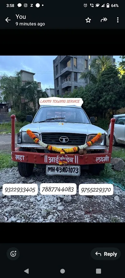 Laxmi towing service,