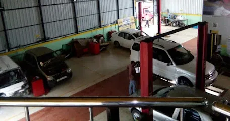 Mahindra First Choice Services - 4 Wheeler- AUTO WORLD CAR CARE
