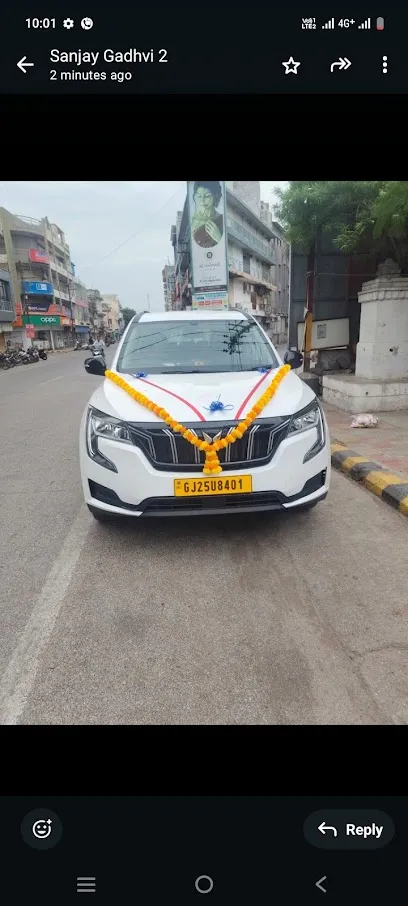 Sainath taxi services porbandar Tempo traveller