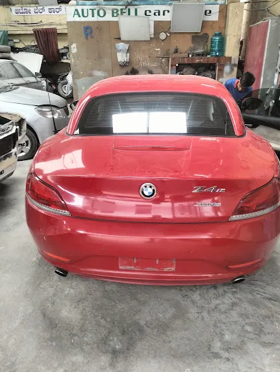 Auto Bell Car Care tinkering and painting
