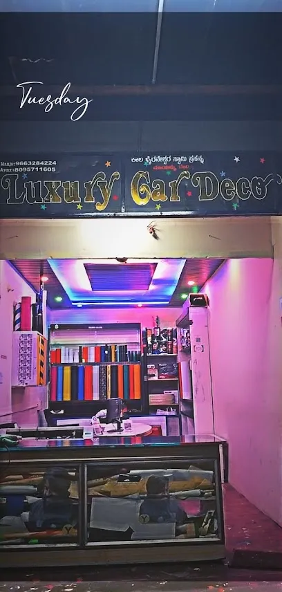 LUXURY CAR DECOR AND STICKER CUTTING. KIRAN D N SON OF NAG
