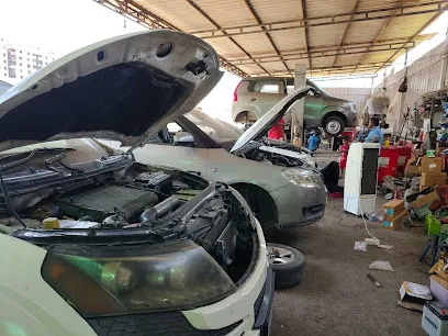 Vineet Motors | Car Service Center, Car Wash & Accessories in Surat