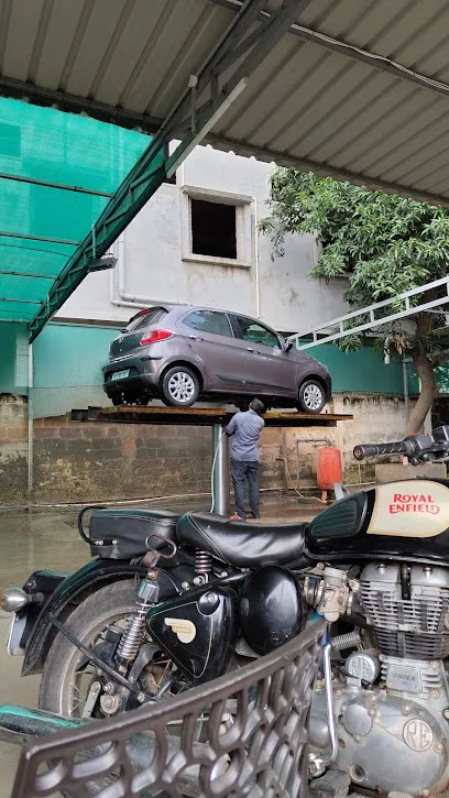 Jahnavi sri tirumala car bike foam wash and realestate