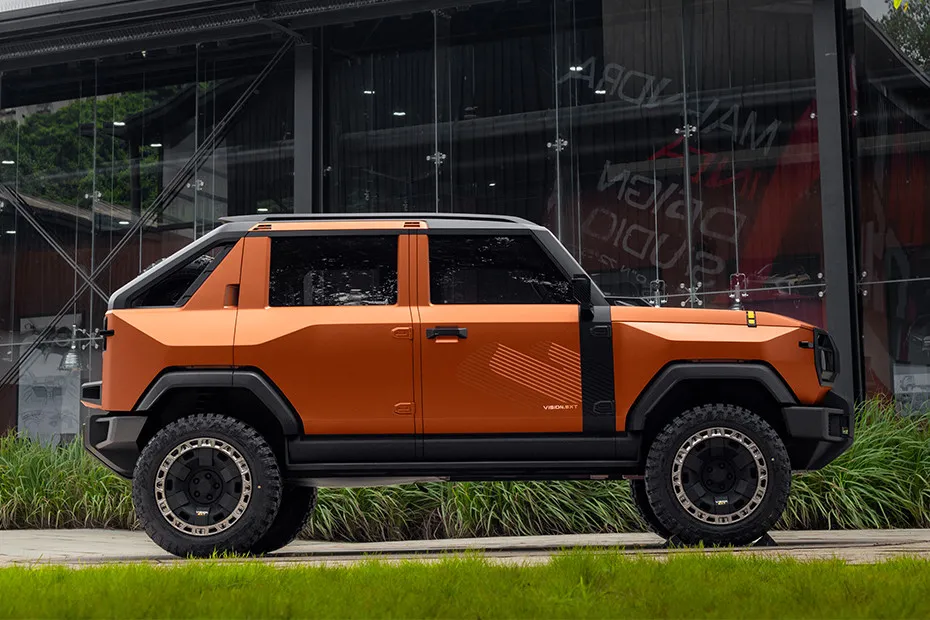 Mahindra Vision SXT Driving: Side Profile (Right) View