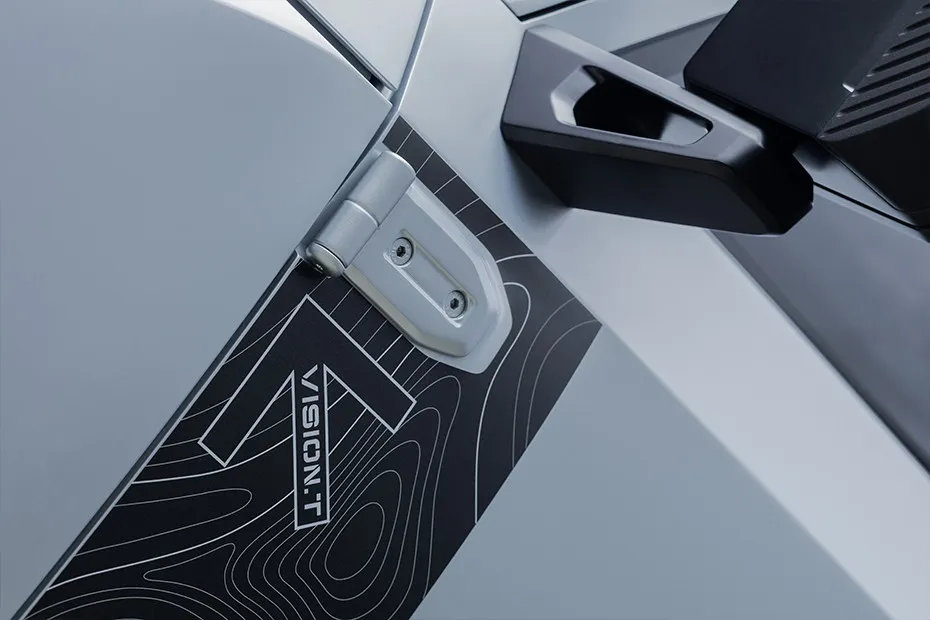 Mahindra Vision T Variant Badge
