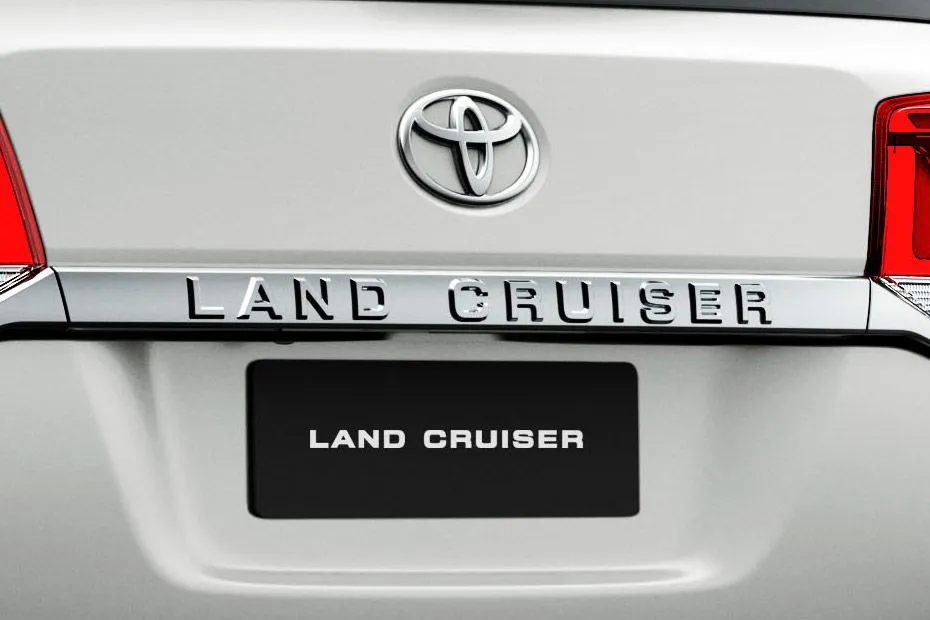 Toyota Land Cruiser 200 At the rear, the Toyota SUV gets a bold chrome bar with Land Cruiser embedded neatly and nicely. It sure gives the car a charming appeal.