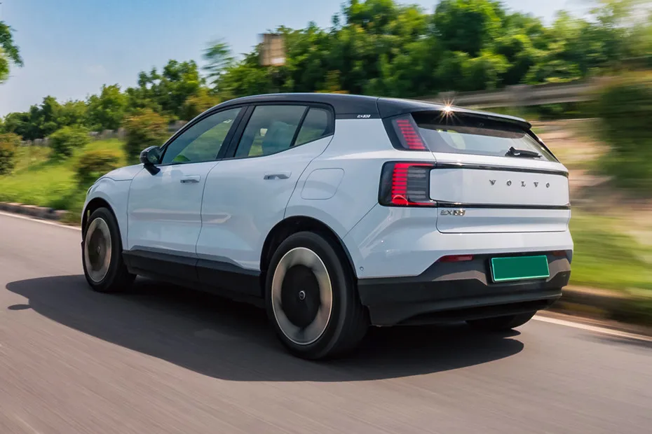 Volvo EX30 Driving: Rear Left Three Quarter View