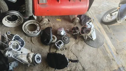 Bike mechanic.POPULAR.SCOOTER.WORKS.SHOP.