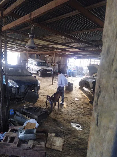Boy Four Wheeler Repair Workshop