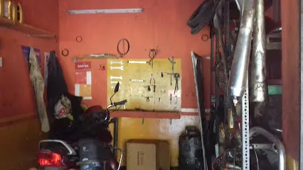 Friends Two Wheeler Work Shop
