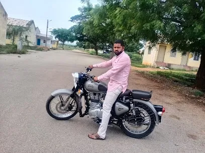 KaranatakaTwo wheeler garege
