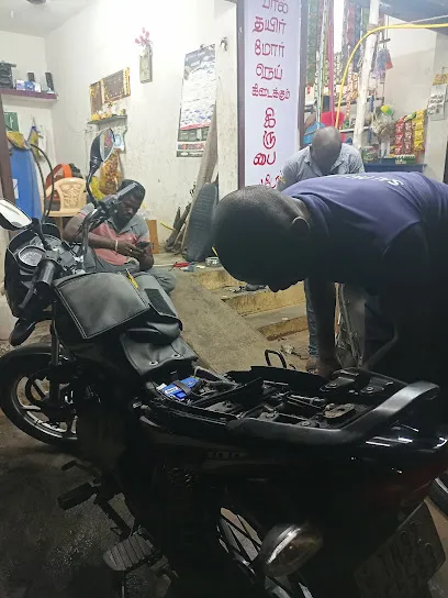 Mahisha two wheeler work shop