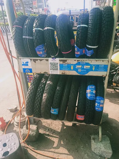 Mangalagiri tenali road tyre shops
