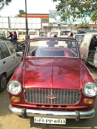 Manish' Car & Bike Garage Infocity