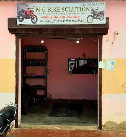 M.g auto (two wheeler garage)
