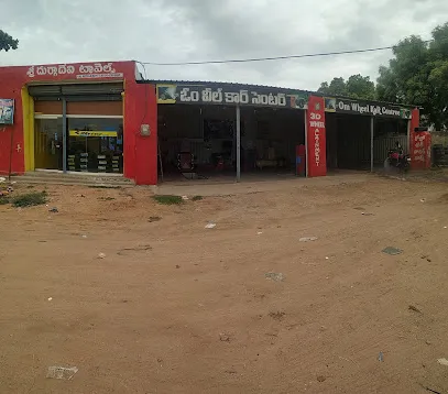 Om wheel car centre
