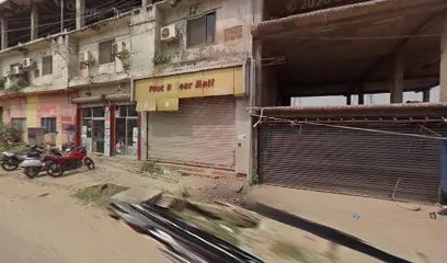 Saddam Motorcycle Garage