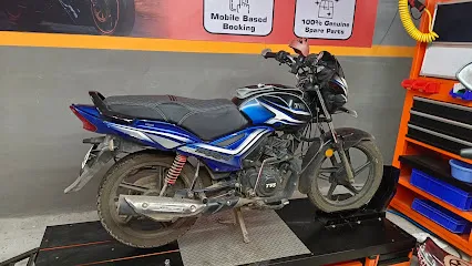 Smart garage multibrand two wheeler service centre