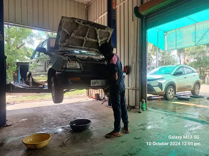 SRI MAHINDRA AUTO MOTIVES (carbon cleaning) and (car mechanic garage)and(bike&car foam wash)and(head lights cleaning)