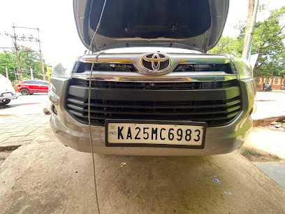 KARNATAK EMISSION TESTING PUC CENTRE DHARWAD & VEHICLE INSURANCE