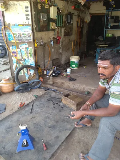 Belludi tyers s puncture shop
