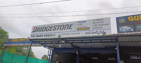 BRIDGESTONE-TOP MARK WHEELS