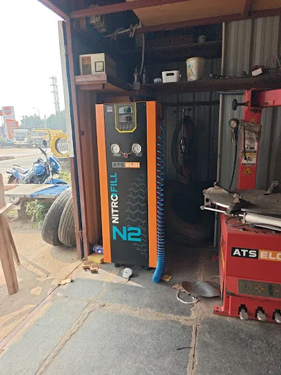 Friends tyre puncher shop, nitrogen air filling,car travels.