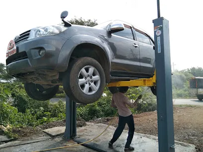 Jay ambe tyres alignment & balancing