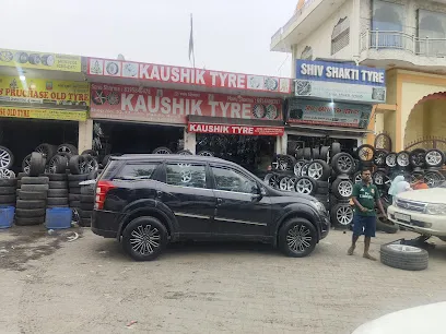 Kaushik tyre shop no.32/33 sector 45 motor market road burail near Shiv mandir chandigarh