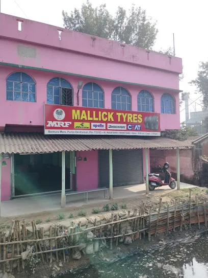 MALLICK TYRES near by joyguru parking Bankuramore purba Bardhaman