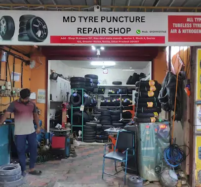 MD tyre puncture repair shop