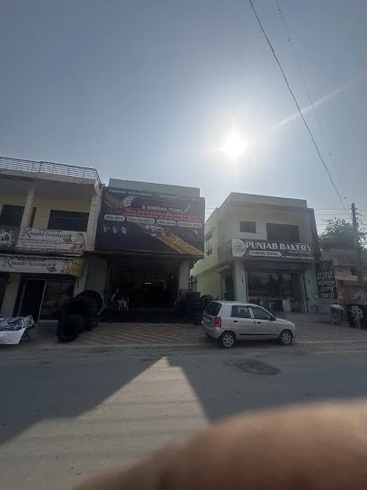 NEW SANDHU & ROMANA TYRES