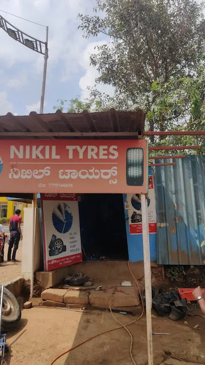 Nikil Tyers & Puncture Shop