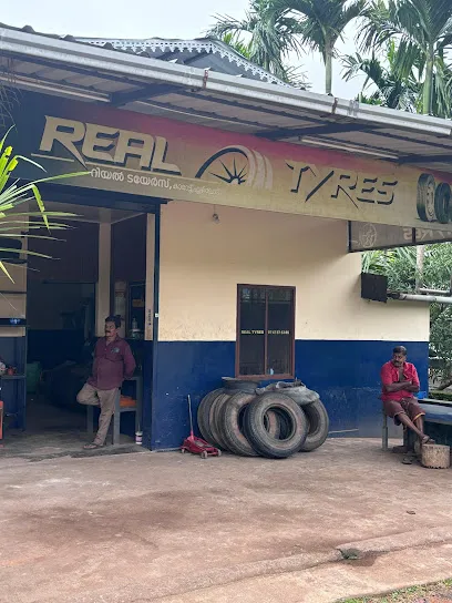 Real Tyres,Resoling and Puncture Service, Ezhilode