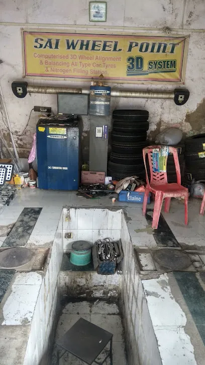 SAI WHEEL POINT (wheel alignment & tyres Shop) jk ,tvs tyres available & online puc center.