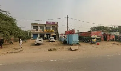 Sajid repairing tyre shop
