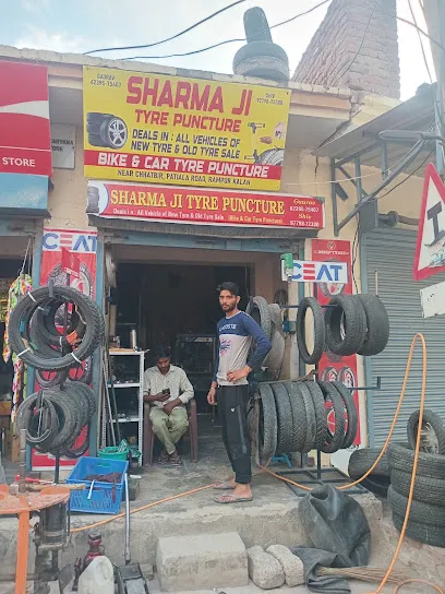 Sharma ji tyre shop