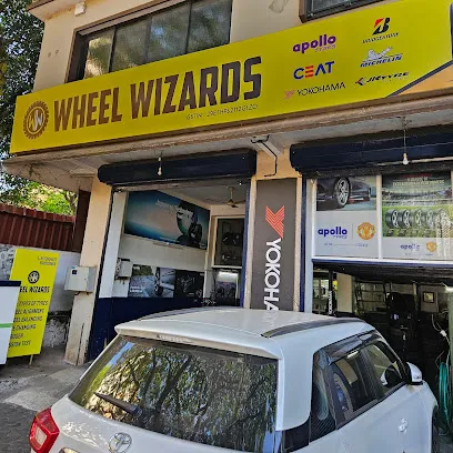 WHEEL WIZARDS AND EMISSION CENTRE