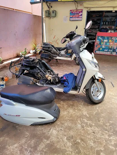Yash Automobiles ( 2 wheeler Spare's, service & Washing center )