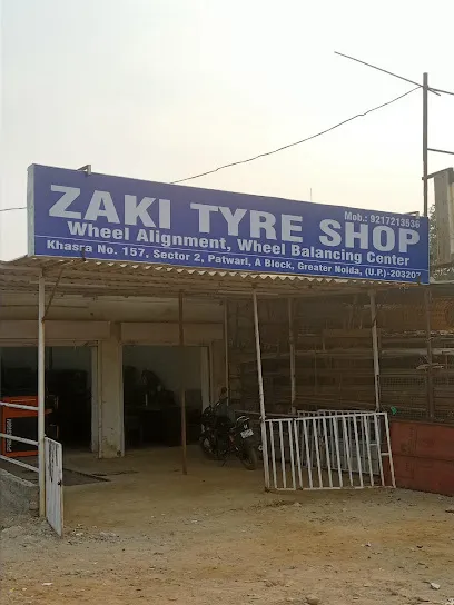 Zaki Tyre Shop // Wheel Alignment & Wheel Balancing Centre